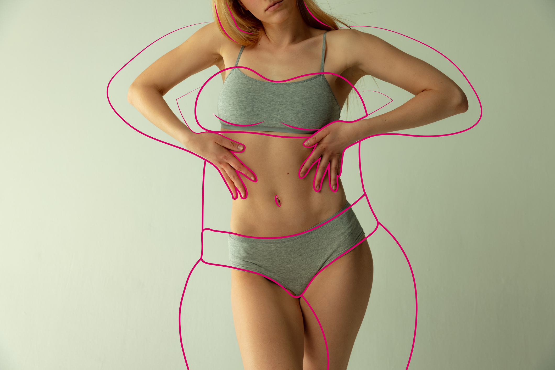 Cropped slim female body with pink lines around body symbolizing bigger body shape isolated over green background Cropped slim female body with pink lines around body symbolizing bigger body shape isolated over green background. Weight loss. Concept of healthy eating, dieting, weight, fitness, ad