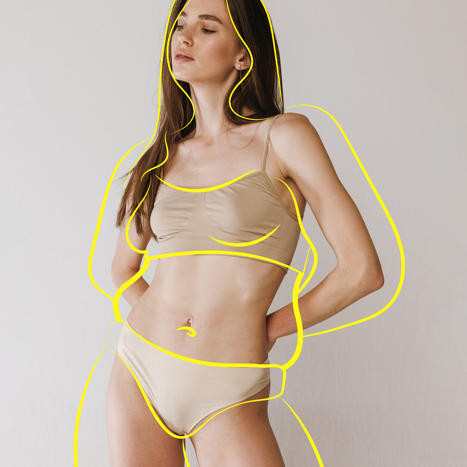Portrait of posing fit girl in lingerie with drawn silhouette overweight woman around body against studio background. Health care. Concept of healthy eating, sport, diet, selfcare. Copy space for ad.